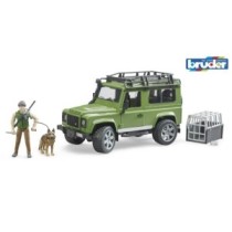 Land Rover Defender jahimehe ja koeraga